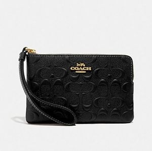 Corner zip Coach wristlet